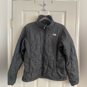 The North Face dk grey L quilted jacket.